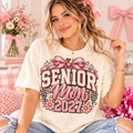 Senior Mom 2027 PNG coquette pink bow varsity shirt design mockup on t-shirt